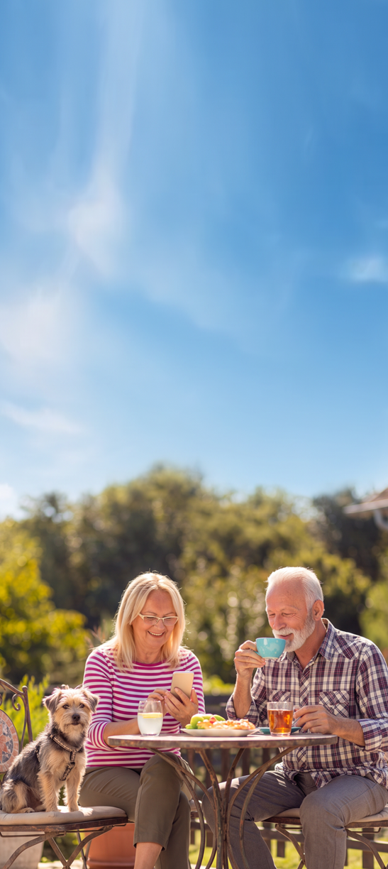 A man and woman sit on a bench, reading books. AI generated content